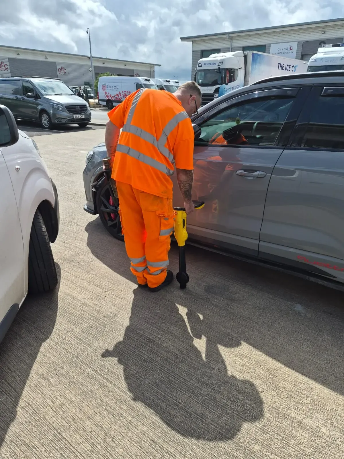 APJ Drainage engineer using a CAT scanner to trace underground drainage pipes in a commercial car park